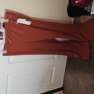 Brand new brown dress pants with tag still attached.